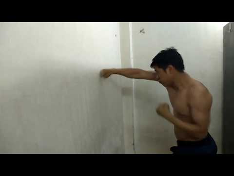 Punch Practice  at Wall / Om Bahadur Thapa