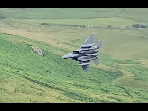 Mach Loop RAF Hawks and USAF F-15 Eagle low level, great sound.