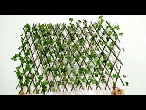Wall decoration piece made up of artificial leaves and sticks (large)