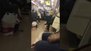 Trumpet Players Perform a Solemn Song on the Tokyo Subway