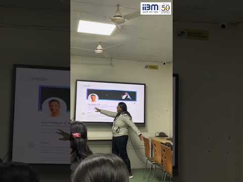 students actively building and refining their LinkedIn profiles as part of a hands-on activity.