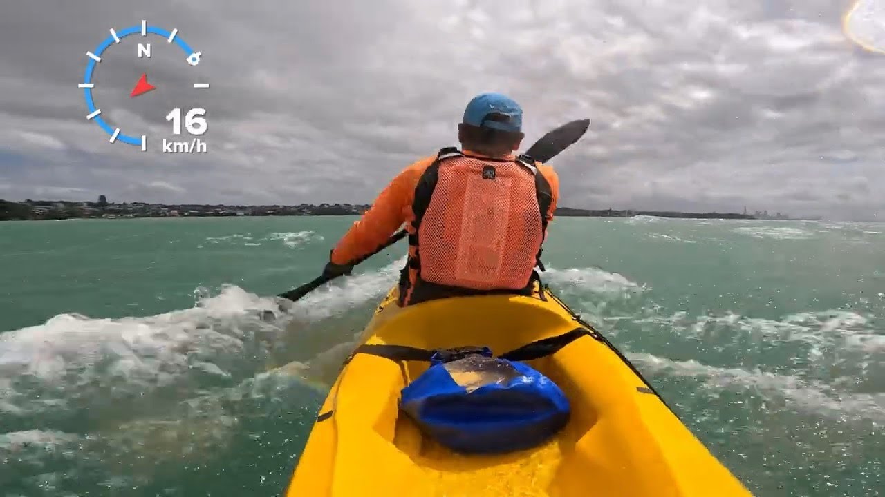 Paddling an Ocean Kayak Scupper Pro downwind. It flies!