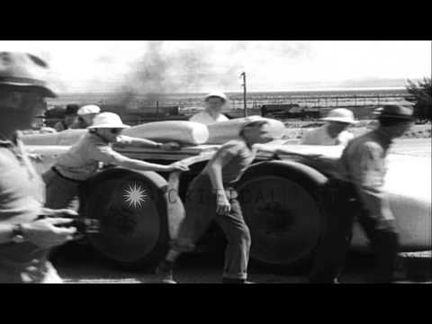 Captain Eyston in his Thunderbolt car in Wendover, Utah. HD Stock Footage