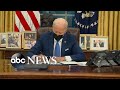Biden signs executive orders to undo Tru