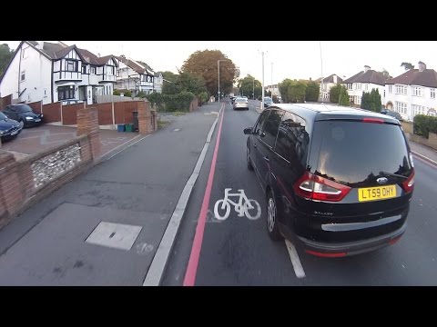 LT59OHY - Taxi driver tries to run cyclist off road?