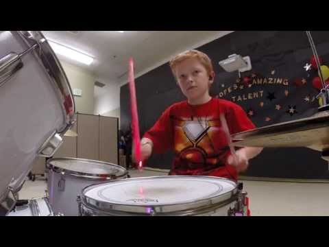 Iron Man 10 year old drumming. Starts at 3:35