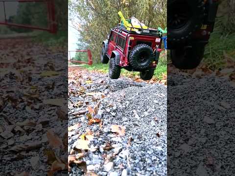 Traxxas land rover defender jumps over a mound of gravel #traxxas #landrover #defender #crawler #rc