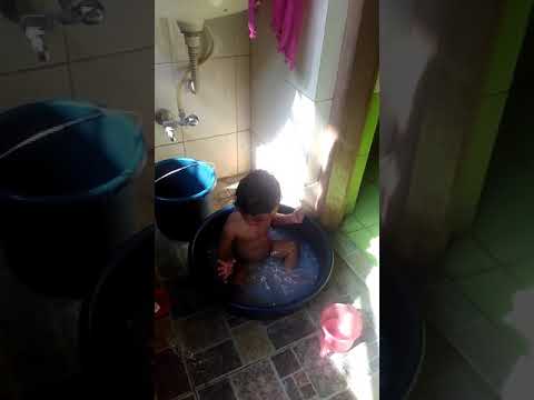 Baby child enjoying bath ( didar Singh Bhavnagar )
