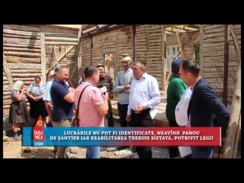 Clădire din LEMN PUTRED, poleită cu bani europeni