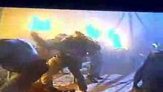 True Lies - gun falling down stairs