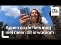 Appen op de fiets verboden: maar wat als je stilstaat? - RTL NIEUWS