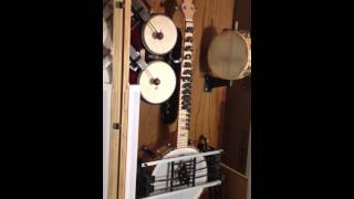 Coin operated automatic banjo playing machine