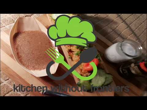 Delicious Surinamese chicken with rice and sate sauce