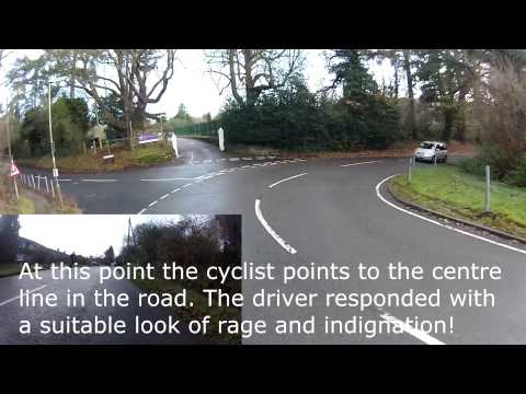 Inconsiderate Cyclist doesn't leave Space for Cars (LT06LWA)