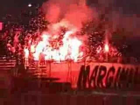 "Salida a la cancha de Curicó Unido en Melipilla" Barra: Los Marginales • Club: Curicó Unido