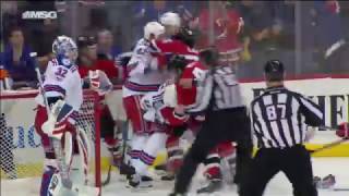 Holden drives Wood into stanchion, line brawl ensues