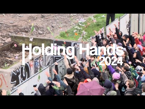 HOLDING HANDS 2024
