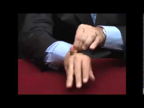 Saturn Magic -Coin thru Hand (US Quarter w/DVD) (D0069) by Tango - Trick