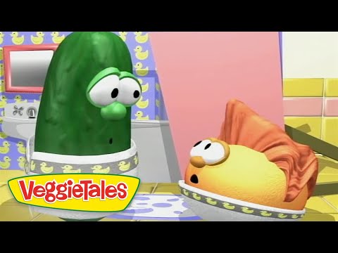 Green cucumber character and an orange veggie wearing bibs in a colorful VeggieTales kitchen set; VeggieTales logo visible in the bottom left.