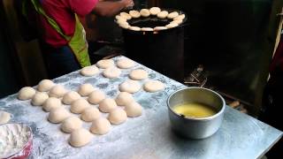 preview picture of video 'Burmese Breakfast Adventures: Coconut Doughnuts'