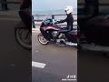 Biker Girl In Leather Smooth Ride By The Ocean