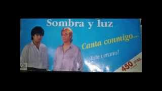 sombra y luz dame un beso amor