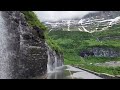 Cycling past the Weeping wall in Glacier National Park