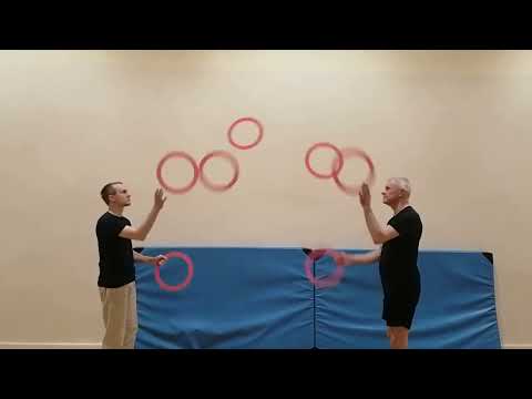 Żonglerka  = Juggling - passing 7 Rings