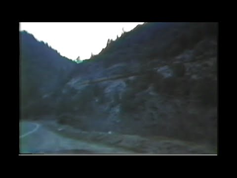 1044. UNION PACIFIC UP 3763 across bridge in feather river canyon on March 1989 with 4 freight engin