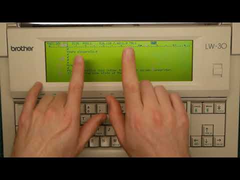 Hjalfi processes words on his new word processor