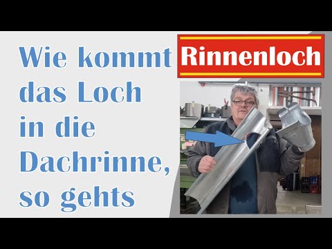 Rinnenloch. Wie wird das Abflussloch in die Dachrinne gemacht mit Lochsäge oder Stemmeisen.