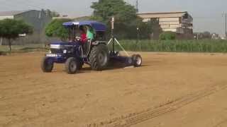 preview picture of video 'Landking Laser Land Leveler at Chauhan Farm Patiala'