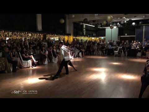  Vanesa Villalba  and  Facundo Piñero  are  dancing  to  the  tango  "  A Evaristo Carriego  "  by  Osvaldo Pugliese  at  Singapore International Tango Festival  in  2018