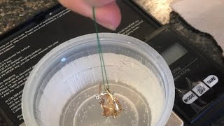 using “water” to PROVE “real gold” (specific gravity)