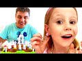 Nastya e papai brincam com a máquina de Nastya e papai brincam com a máquina de
