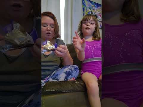 Layla trying Mr. Beast chocolate