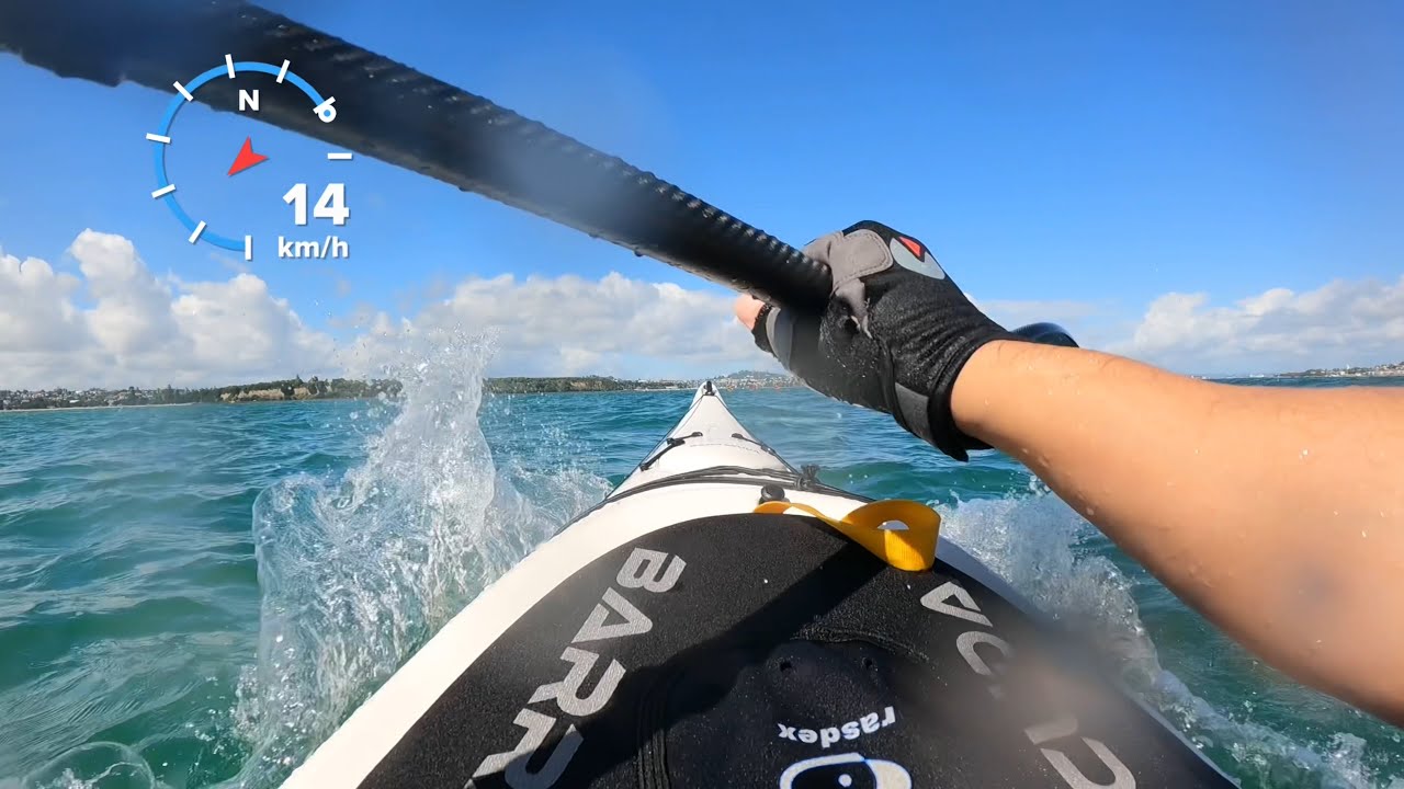 Surfing on the Barracuda Beachcomber sea kayak!