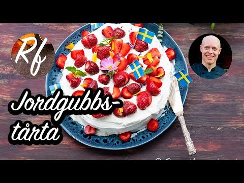 En enkel jordgubbstårta med tårtbottnar av sockerkaka med jordgubbar, grädde och vaniljkräm eller mosad banan.>