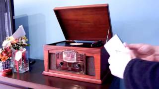 Vitrola Crosley Lancaster 5 em 1 toca discos cassete AM/FM CD Player AUX in