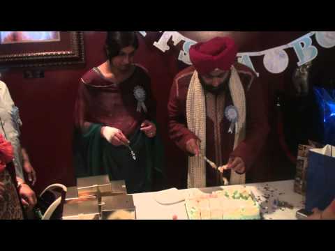 Parminderss Maninder Baby shower Cake cutting