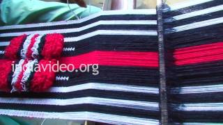 Village woman weaving a Naga shawl 