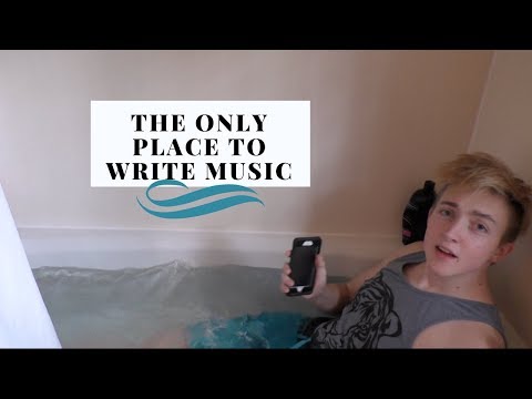 Boy Writes a Song While Fully Clothed in a Bathtub