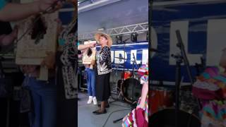 Mom receiving a replica of the Rose Window for her services at H.I.S.D.
