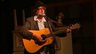 "A Little Wind (Could Blow Me Away)" performed by Peter Case
