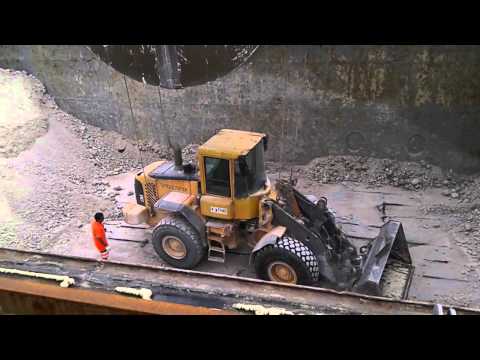 Boarding a bulldozer in a bulk carrier hold for discharging operations