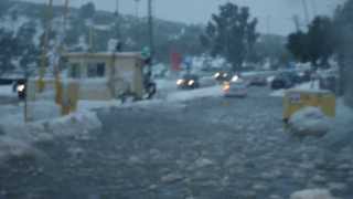 preview picture of video 'Floating over a snow puddle in Ariel, Samaria'