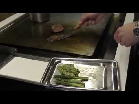 Stefan Karlsson prepares a signature dish at SK Mat & Människor in Sweden