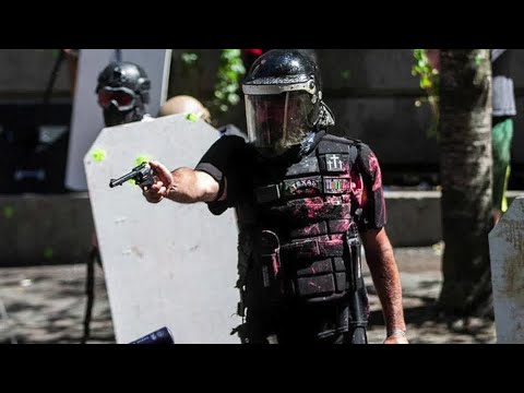 Police arrest 14 after clashes in Portland