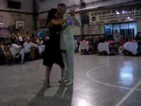  Silvina Valz  and  Dany Garcia  are  dancing  to  the  tango  "  Junto A Tu Corazon  "