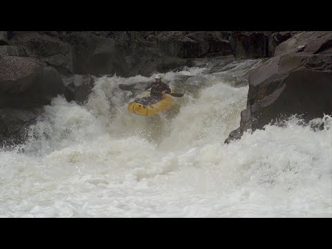 Packrafts boofing the Sandwhich Press on Cataract Gorge